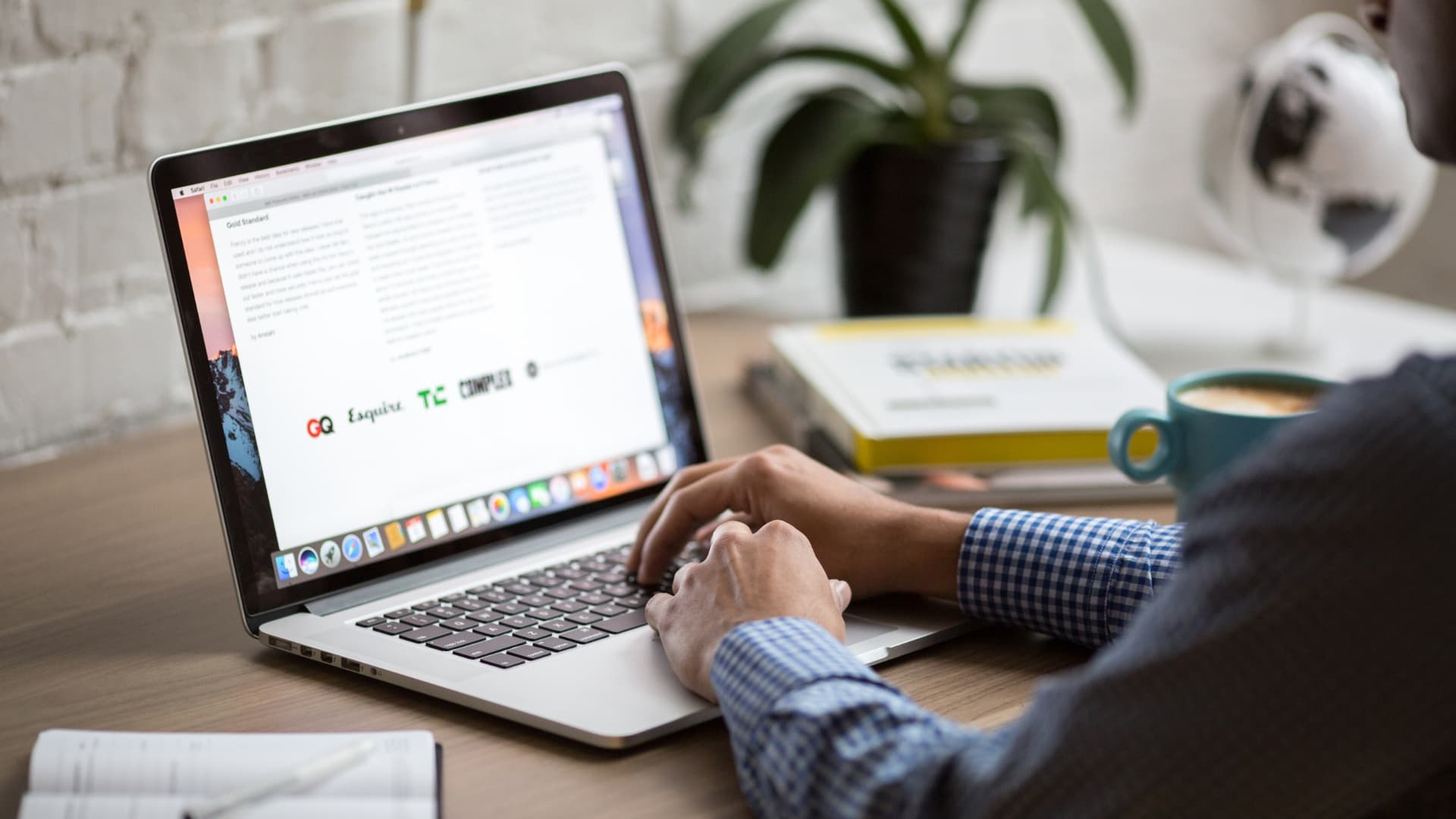 Man at laptop, sending quote email