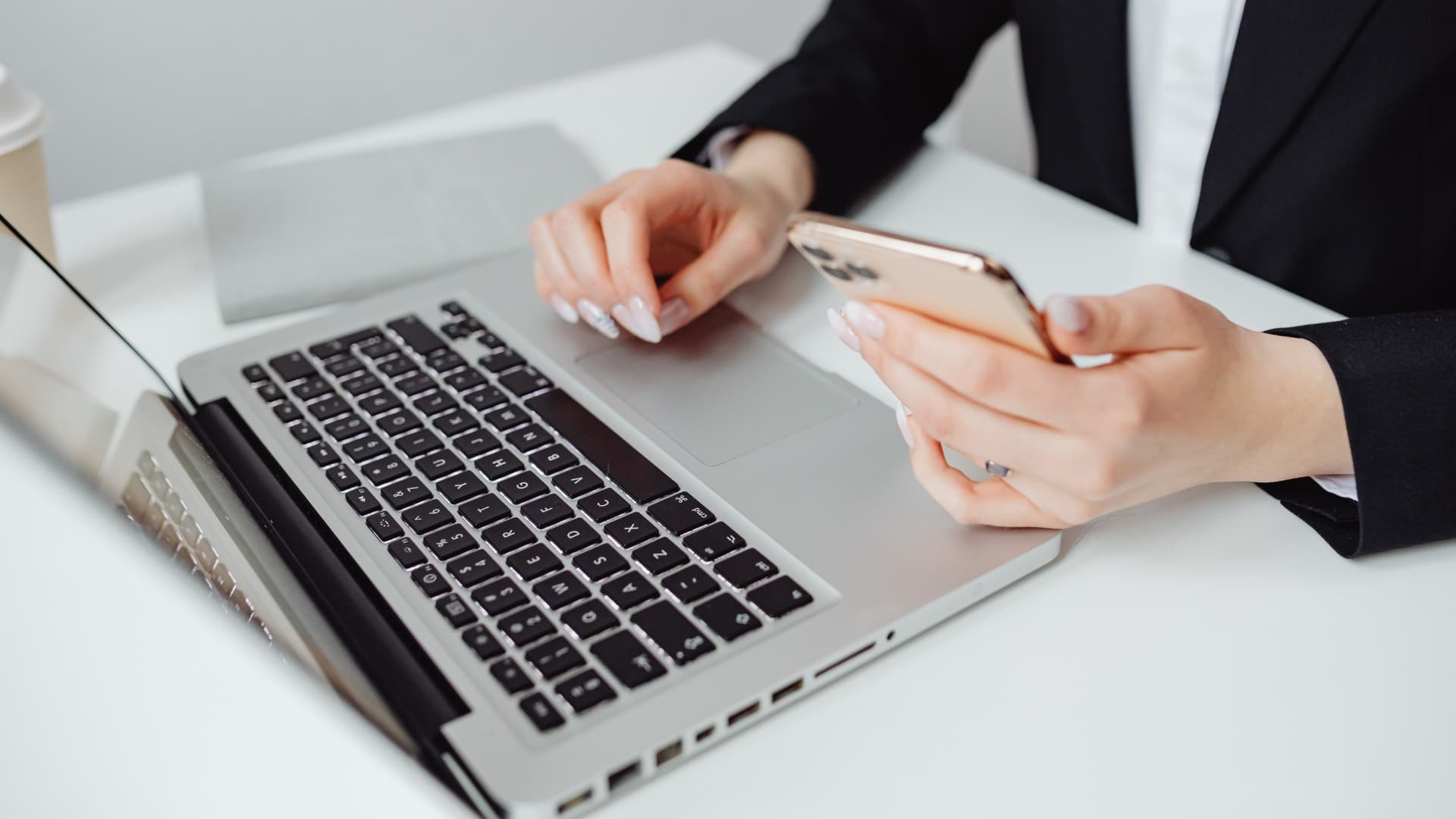 Person at laptop encrypting emails with two-factor authentication