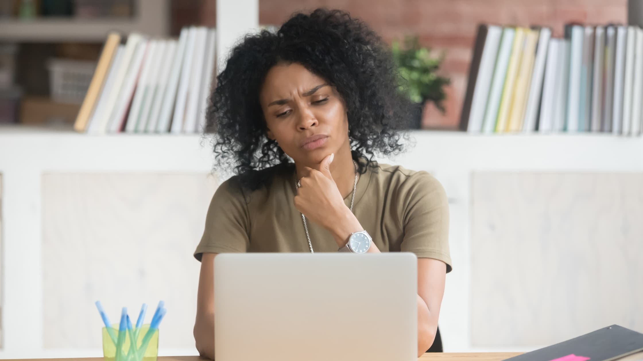 Woman at laptop creating an email account