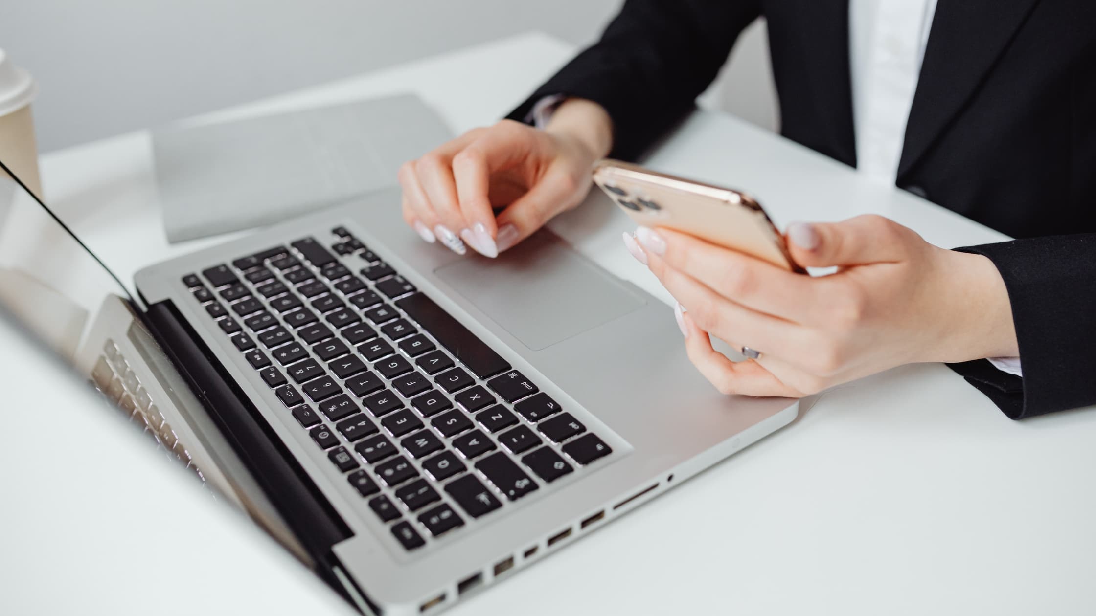 Person at laptop encrypting emails with two-factor authentication