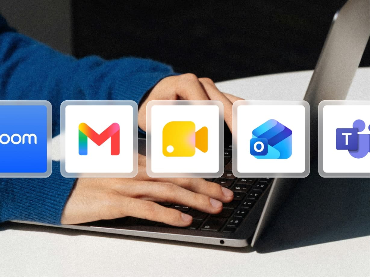 Hands typing on a laptop keyboard, with icons of Gmail, Outlook, Zoom, Microsoft Teams, and Google Meet overlaid, suggesting digital communication.