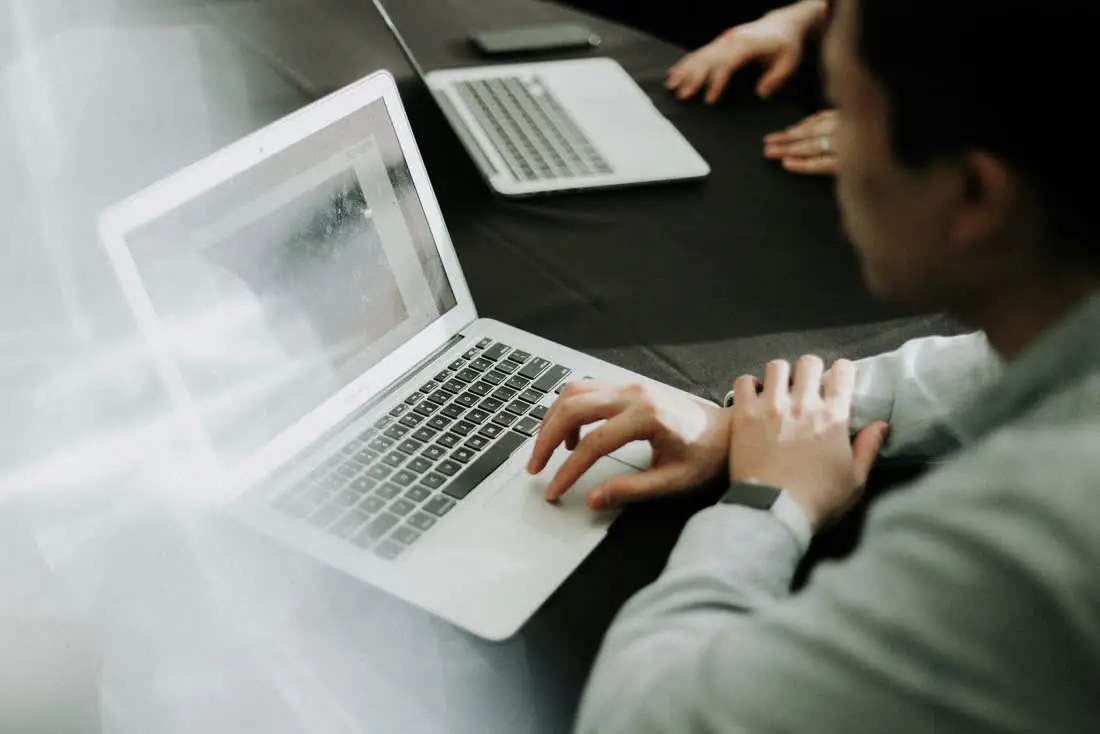 Professional using AI email assistant on their device